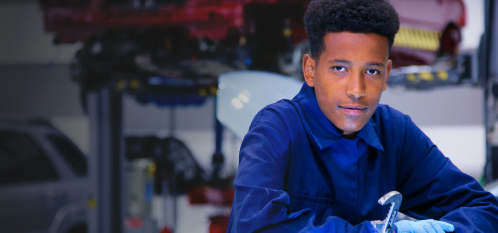 School Of Engineering student holding a wrench