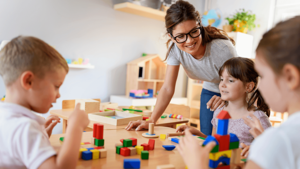 Teacher with a class of children playing and enjoying their time