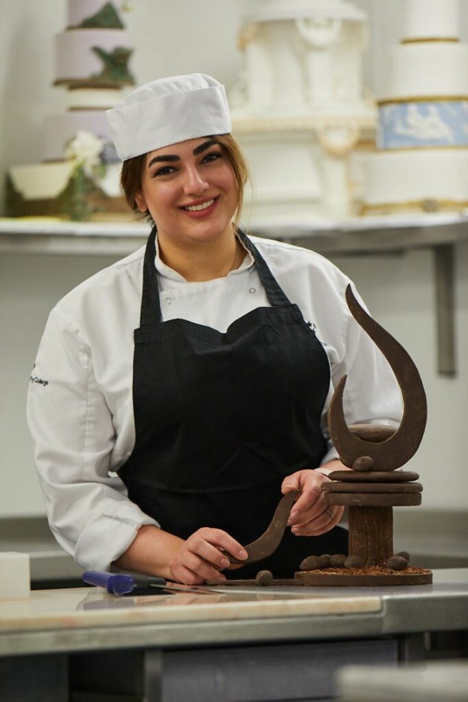 LCC Food and Drink student creating a trophy out of chocolate