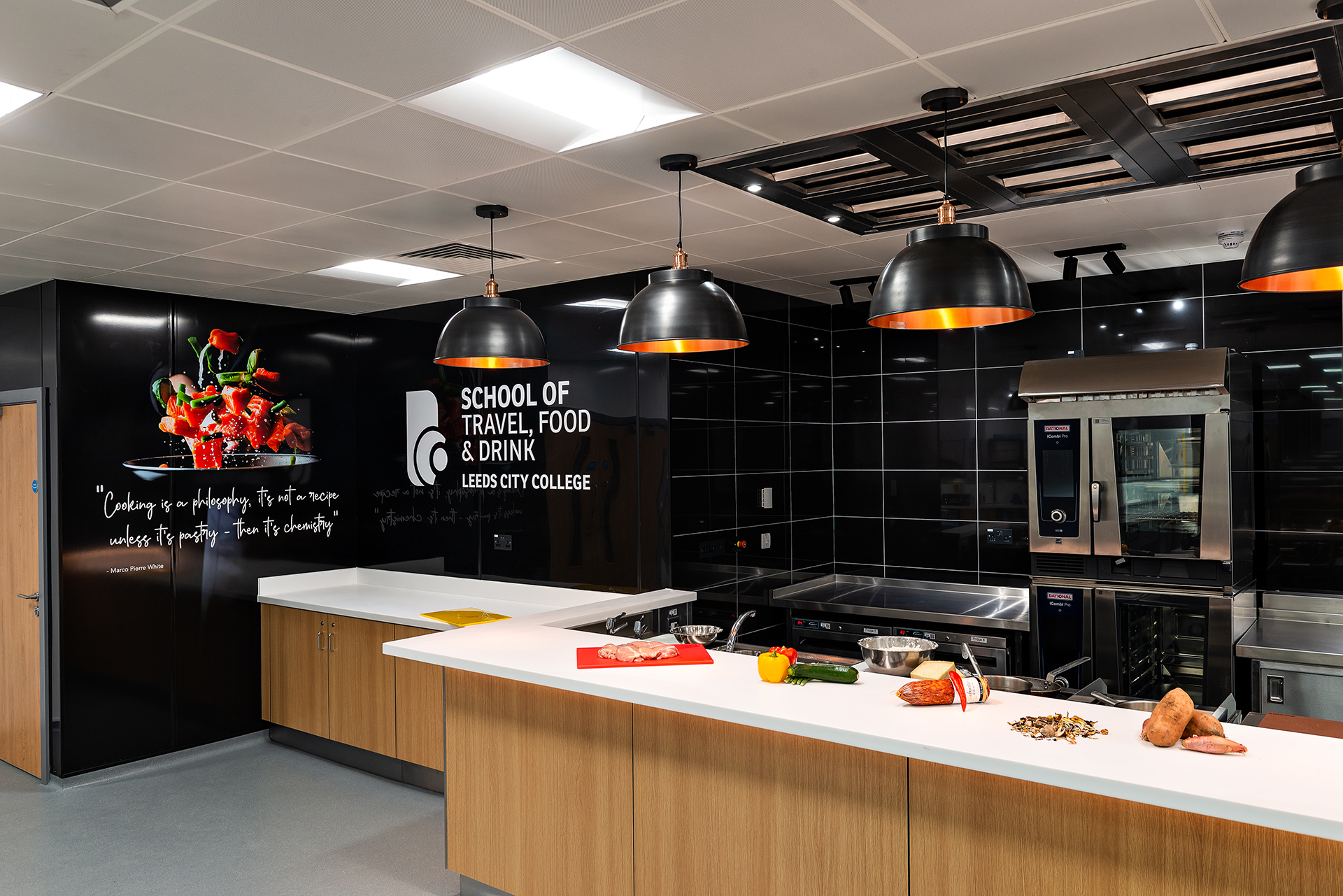 Word-class kitchen with industrial cabinets and worktops at Printworks Kitchen & Bar