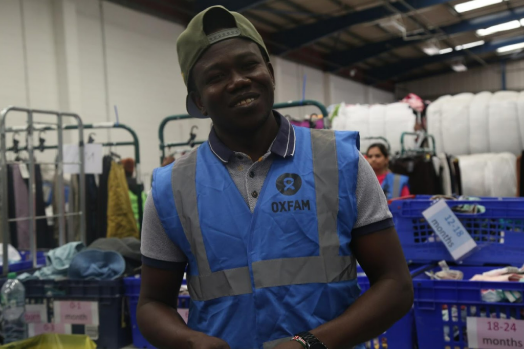 An adult student smiling for the camera