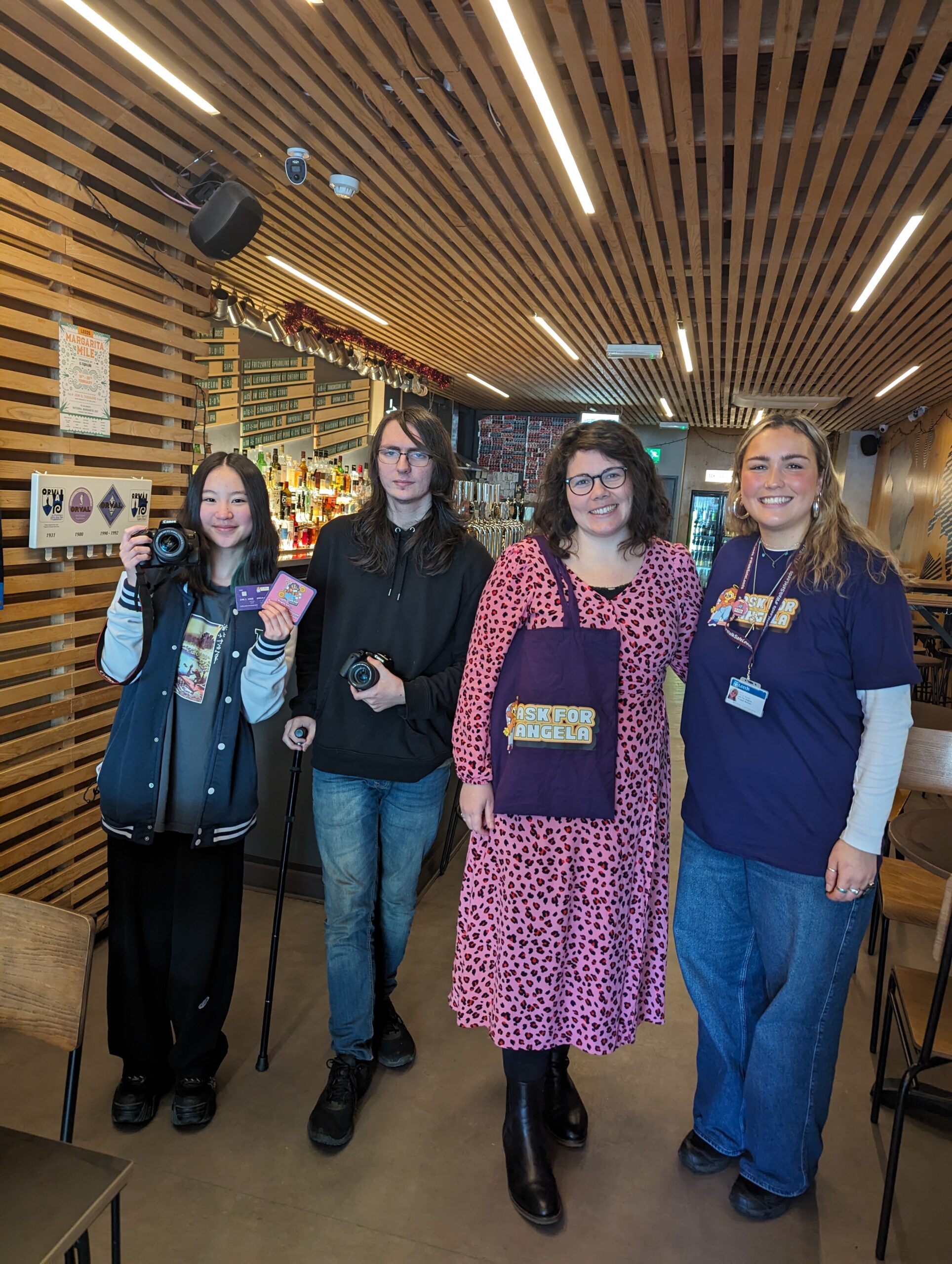 Students and staff standing in a line