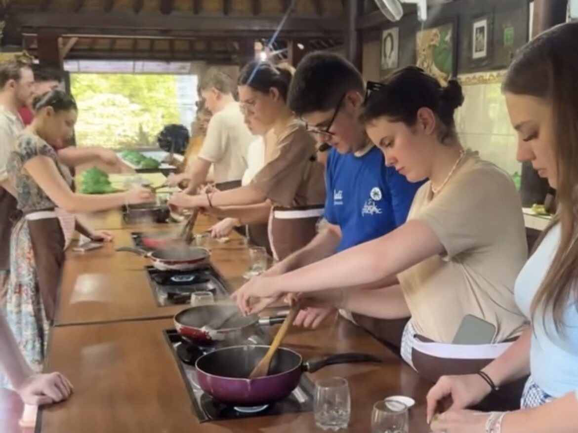 group of students preparing food on work placement