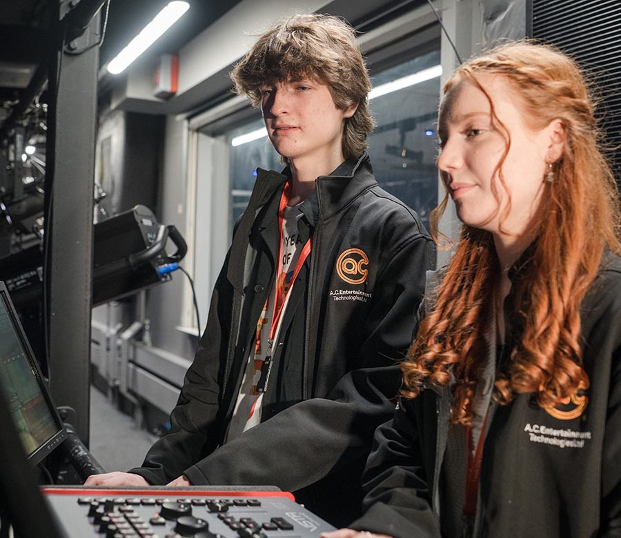 Theatre production students working on the sound production