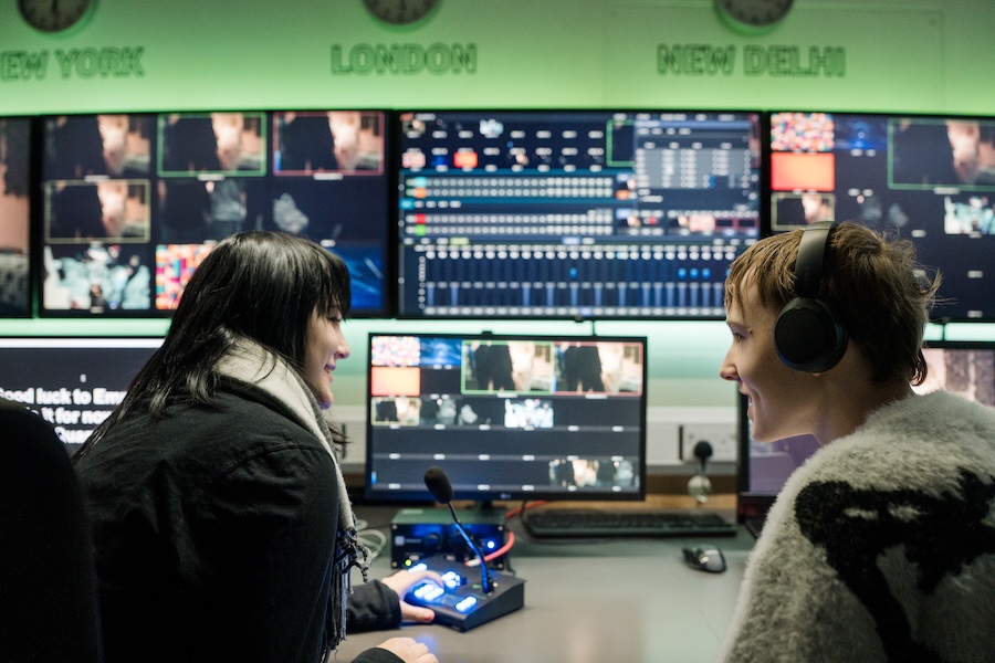 Broadcast students in the studio monitoring the different viewports