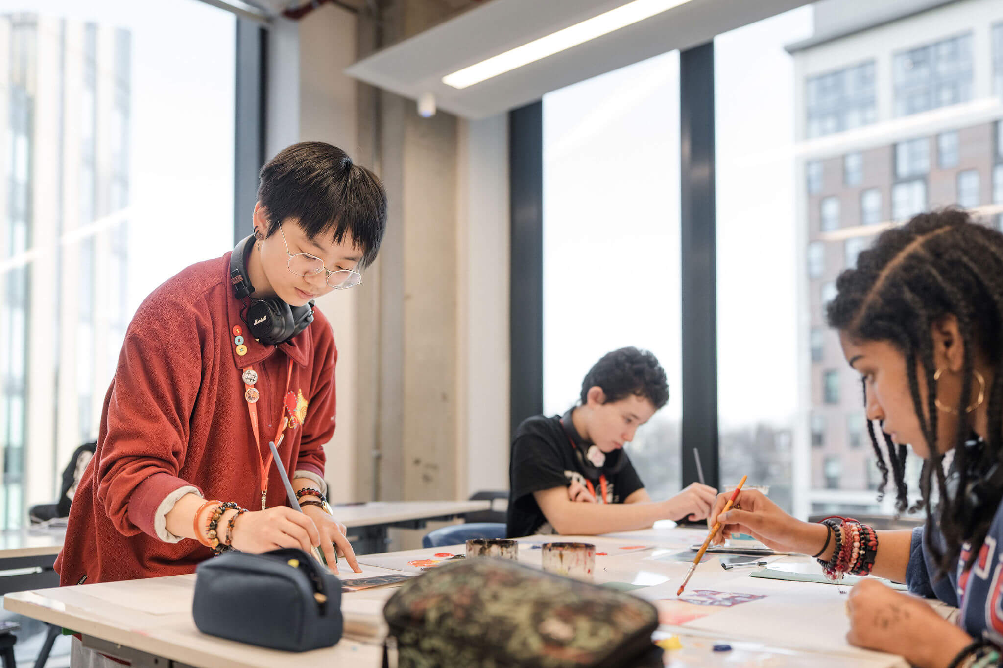 Are students painting at their desks