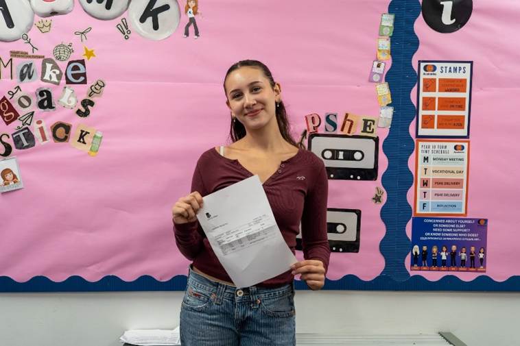 Leeds City College (14+ Academies) student Bella Burling holding her exam results
