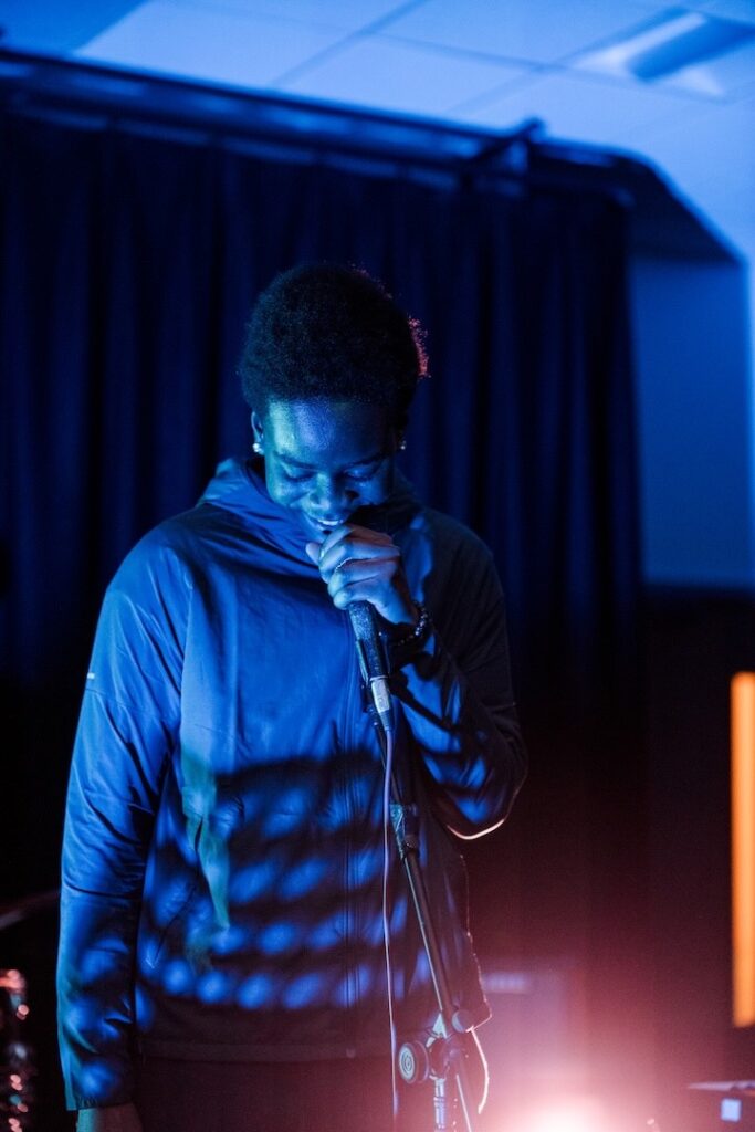 Music performance student singing in a concert/gig