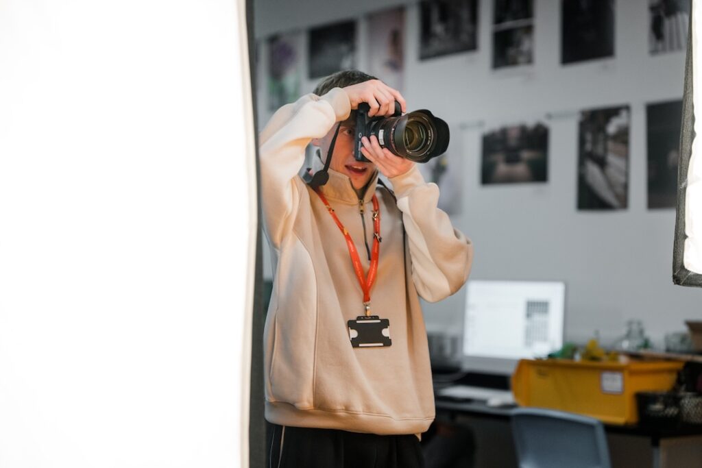 Student using a DSLR camera
