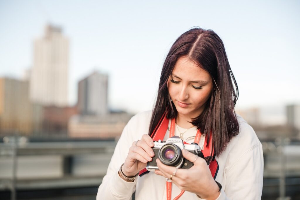 Student using a pentax camera